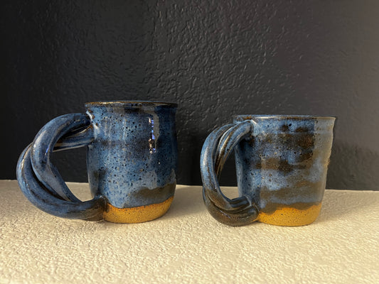 Twisted handle mugs- blue on speckled clay